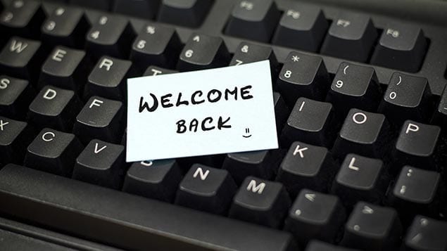 Image of a keyboard with welcome back written on it