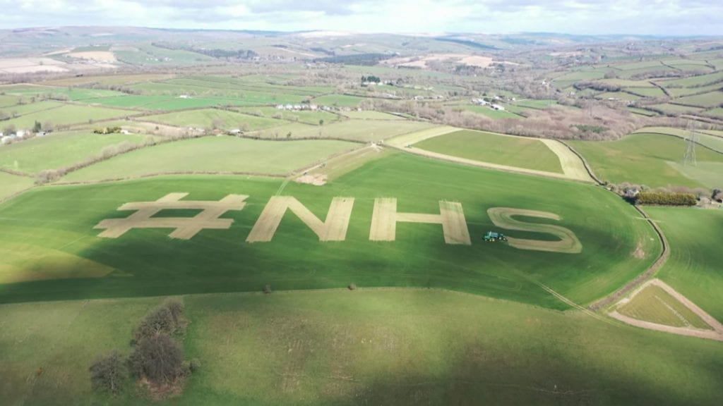 Farmer mows NHS in to his field to show support